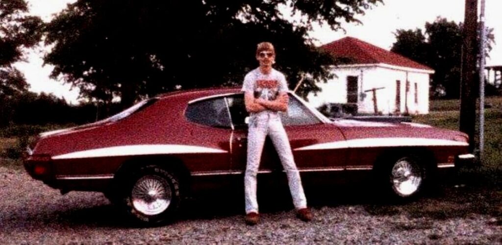 Oliver with his car